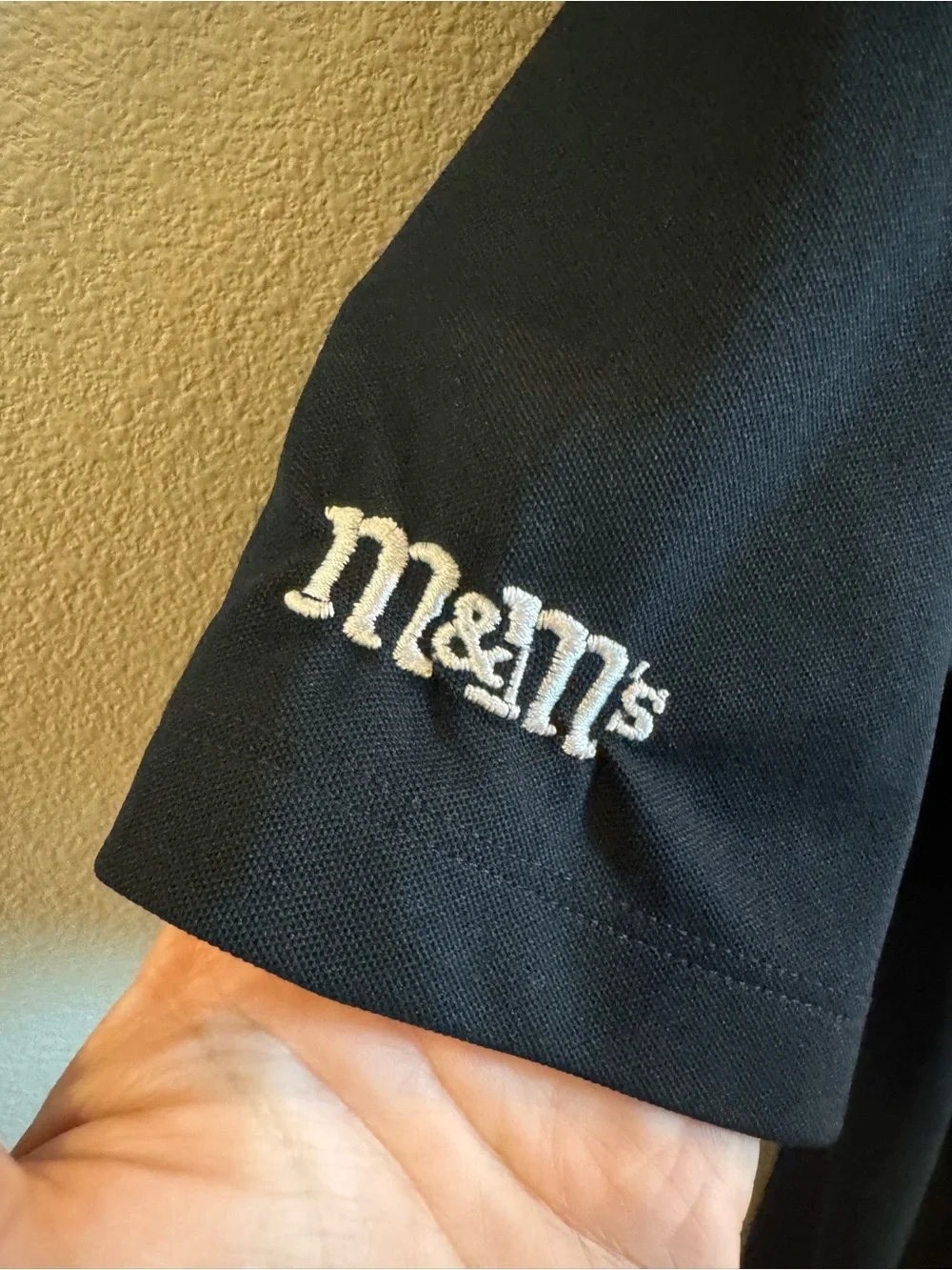 Nike Black Short-Sleeve Polo with Embroidered Purple M&M Character